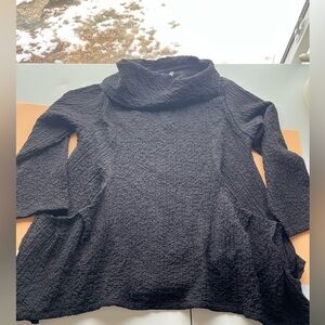 Elegant Black Cowl Neck shirt. Light‎ weight with Flared bottom with pockets